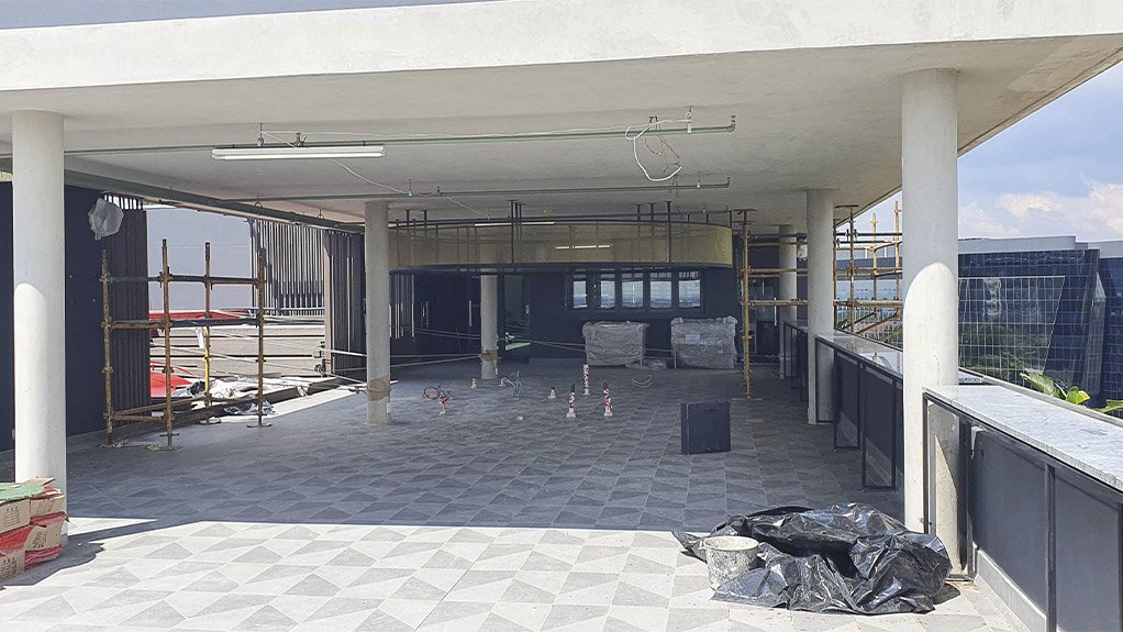 The 7th floor terrace with pool, decking, bar, kitchen and other amenities taking shape