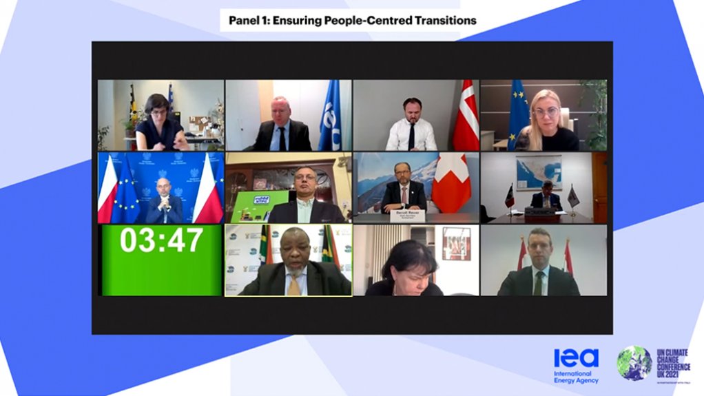 South Africa’s Mineral Resources and Energy Minister, Gwede Mantashe (bottom row far left) speaks during a panel discussion he co-chaired with Denmark’s Climate, Energy and Utilities Minister, Dan Jørgensen (top row second from right)