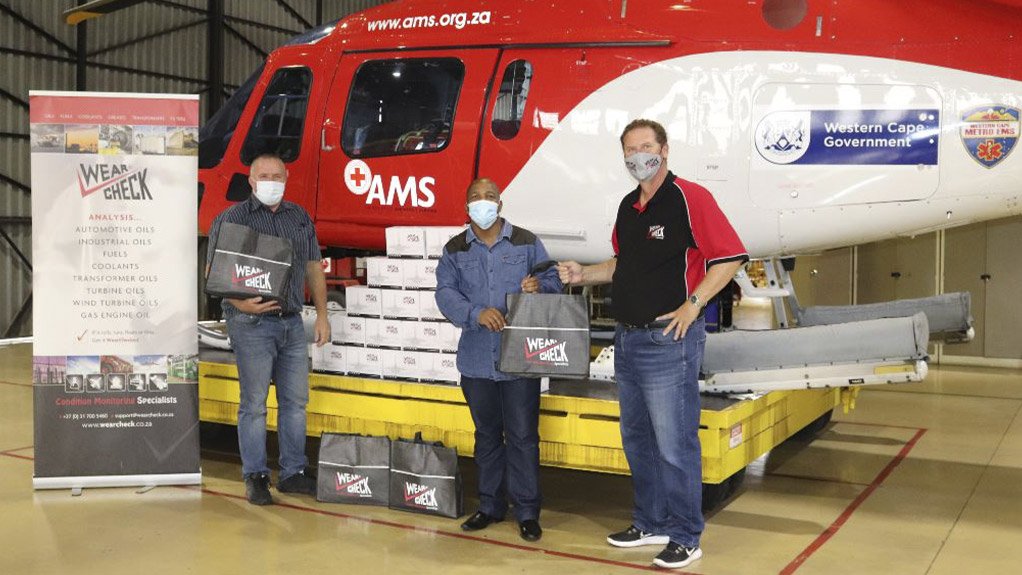 Condition monitoring specialists, WearCheck, recently began an ongoing sponsorship of the test kits for Air Mercy Service (AMS) fleet. Receiving the first kits are (from left) Marc Lawson, AMS AMO manager, Lunga Sityebi, AMS technical controller and Guy Letellier from WearCheck’s Cape Town technical sales team