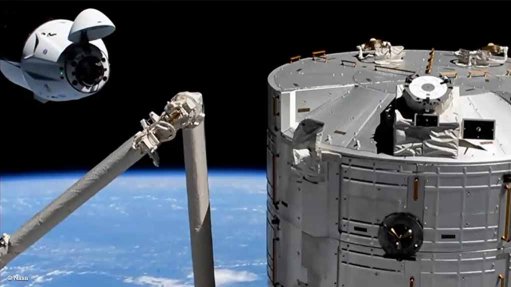 SpaceX Crew Dragon Endeavour (upper left) approaches the ISS (right foreground) for docking