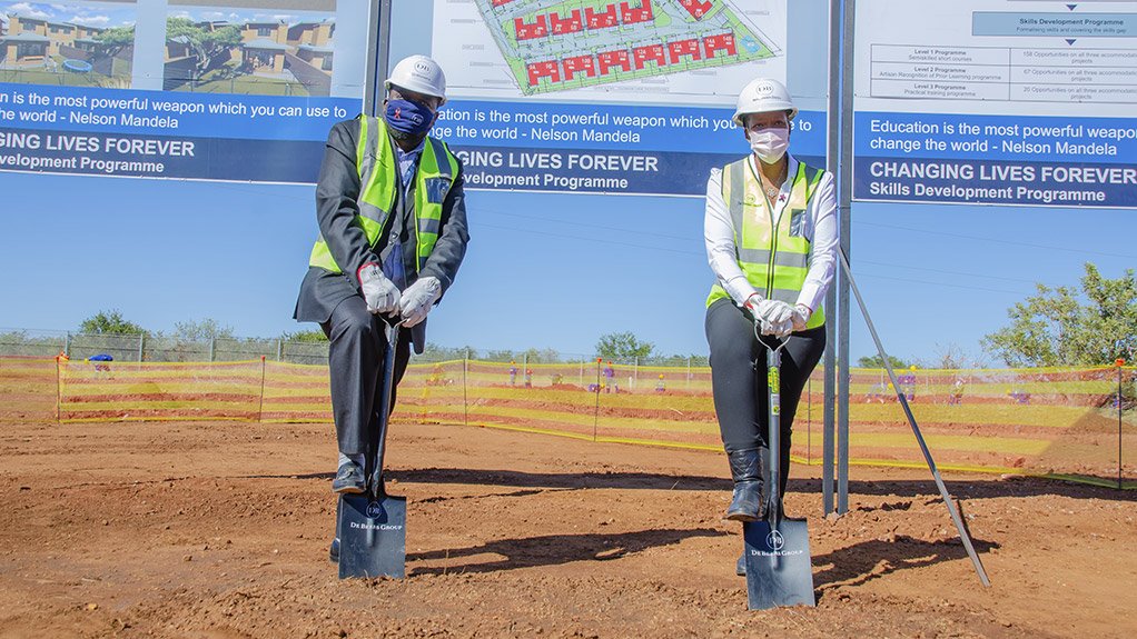 De Beers Group Managed Operations Managing Director, Mpumi Zikalala and Acting Mayor of Musina Local Municipality, Councillor Jeremiah Khunwana turning the first sod on the Stand 4 construction site today. The Stand 4 development is one of the Stay in Business accommodation construction projects taking shape in Musina