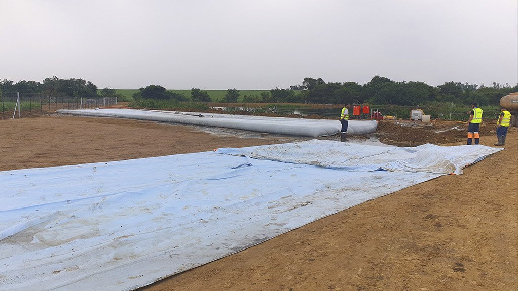 Preparation underway to capture and store the pond water in geotextile bags