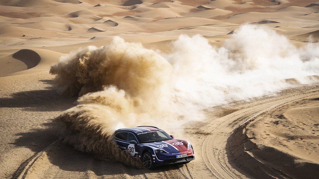 Porsche's newest electric car in desert terrain