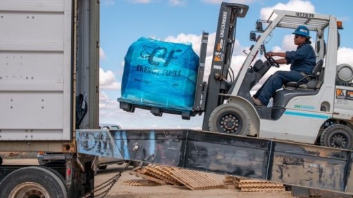 Worker loading rare earth carbonate processed at Energy Fuels' White Mesa, Utah plant into a shipping container for transport to Neo Performance Materials' rare earth separations facility in Estonia, Europe. 