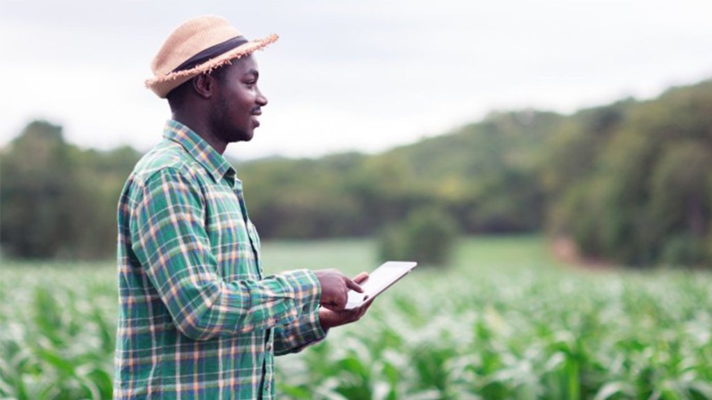A farmer having connectivity out in the field
