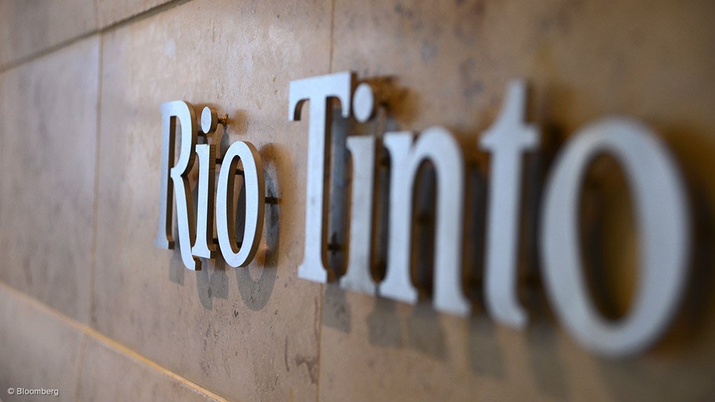 Image is of the Rio Tinto logo outside of its head office