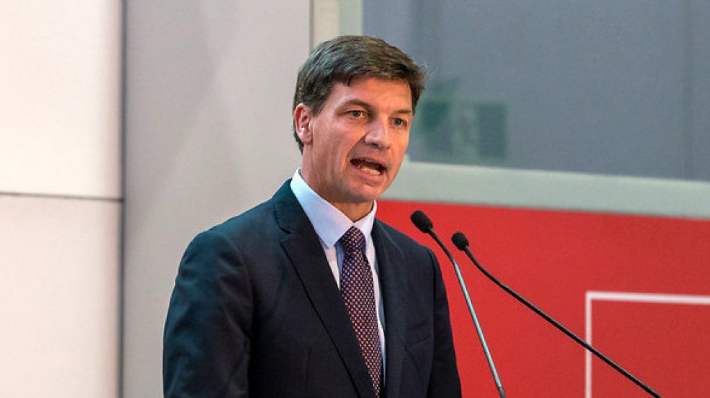 An image of Australian Energy and Emissions Reduction Minister Angus Taylor speaking at an event.