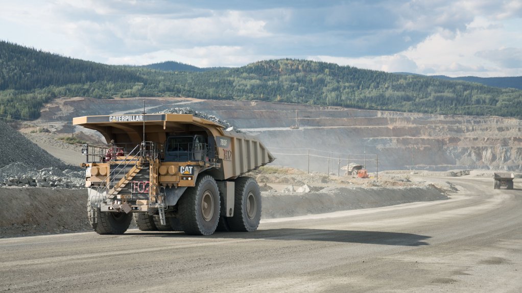 An image of a mine truck operating at the Mount Milligan opencast mine, in British Columbia.