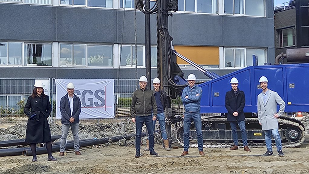 Staff at SGS Group standing in front of a site being constructed at its better testing facility in Spijkenisse near the Port of Rotterdam