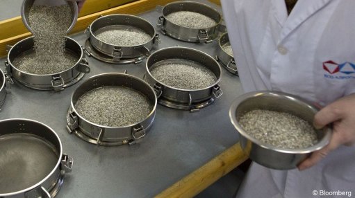 An image of diamonds being sorted.