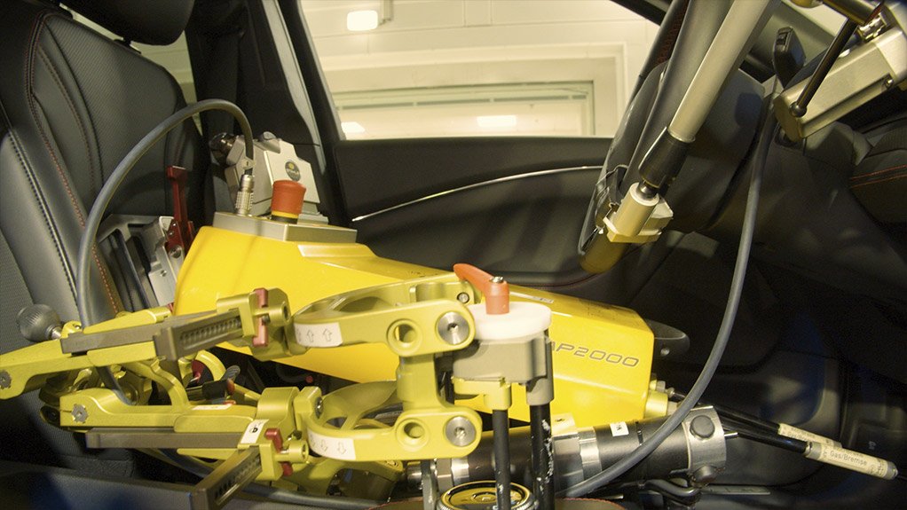 Photo of robot in action Ford Weather Factory