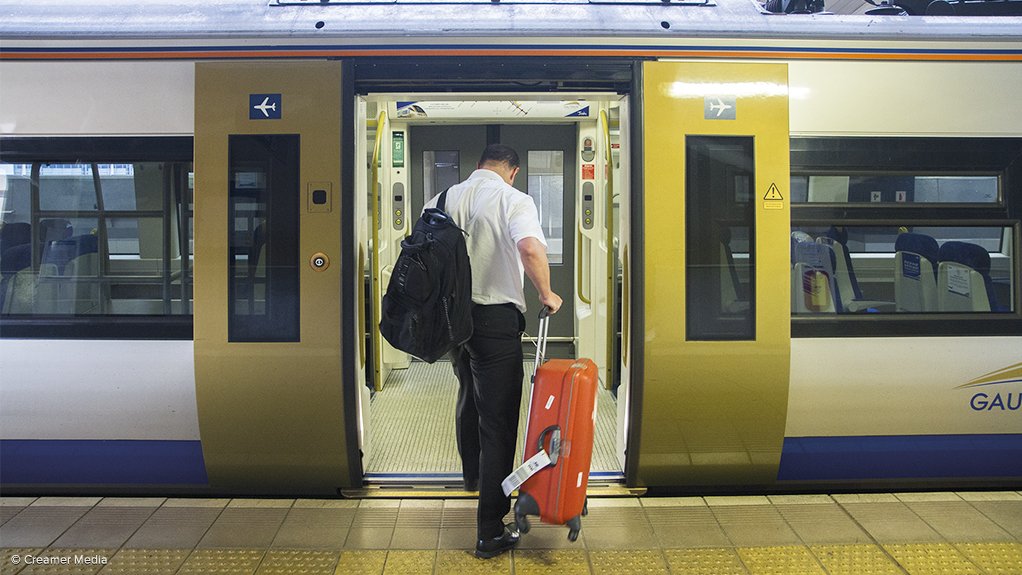Image of a passenger boarding the Gautrain