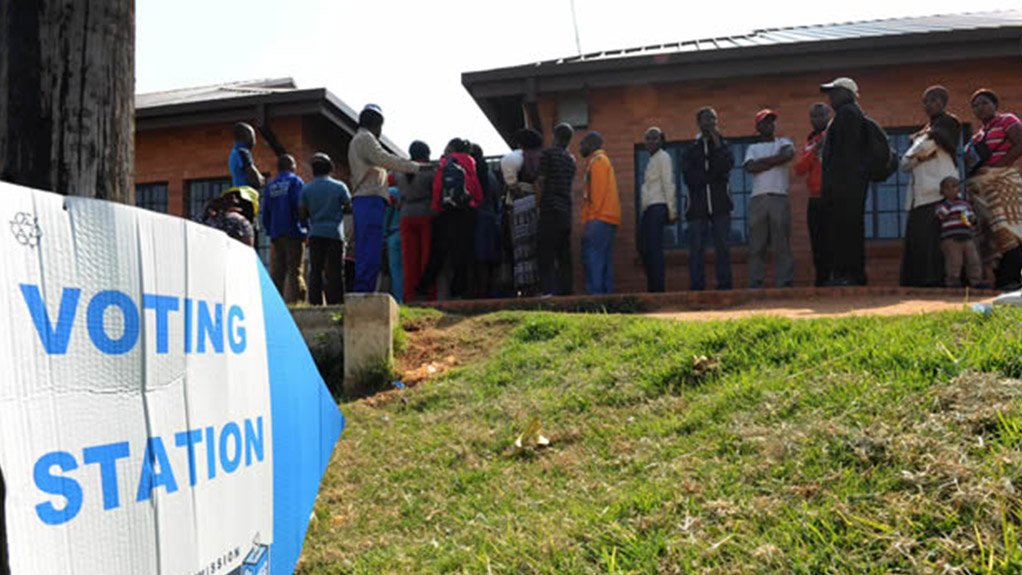 Image of voters outside voting station