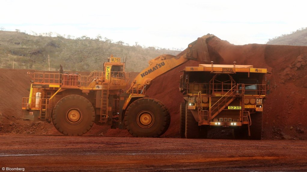 An image of machinery operating on an iron-ore mine in Australia.