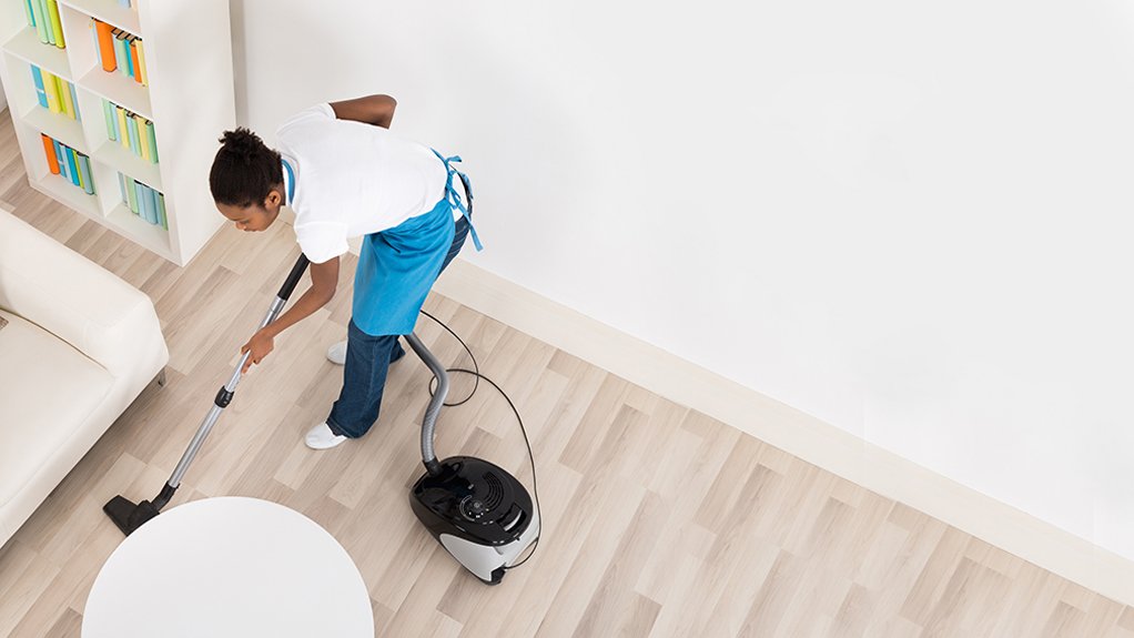 image of helper cleaning the house