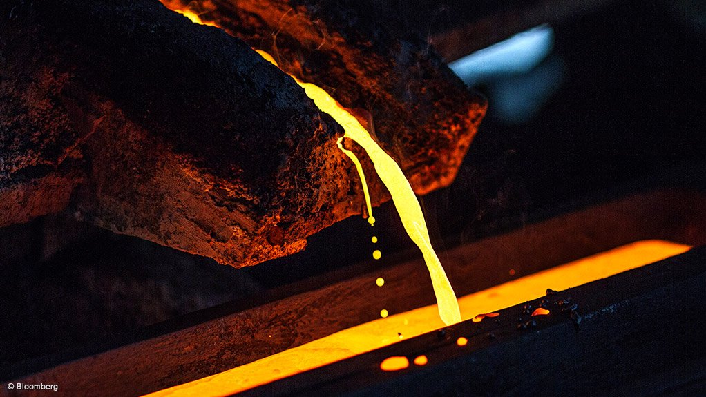 Image shows copper smelt being poured