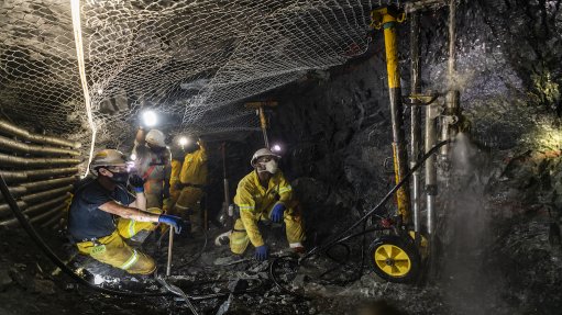Image of miners underground at the Eland mine