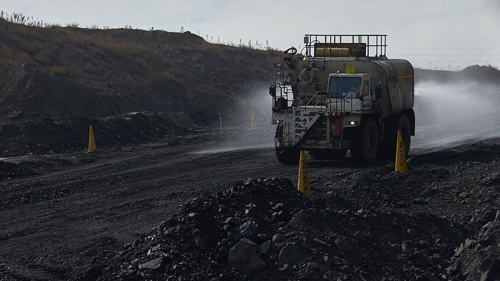 A large Mining mining truck moving through a coal fiel at Kriel Colliery mine in South Africa 