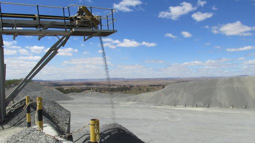 An opencast operation with product pouring onto a pile