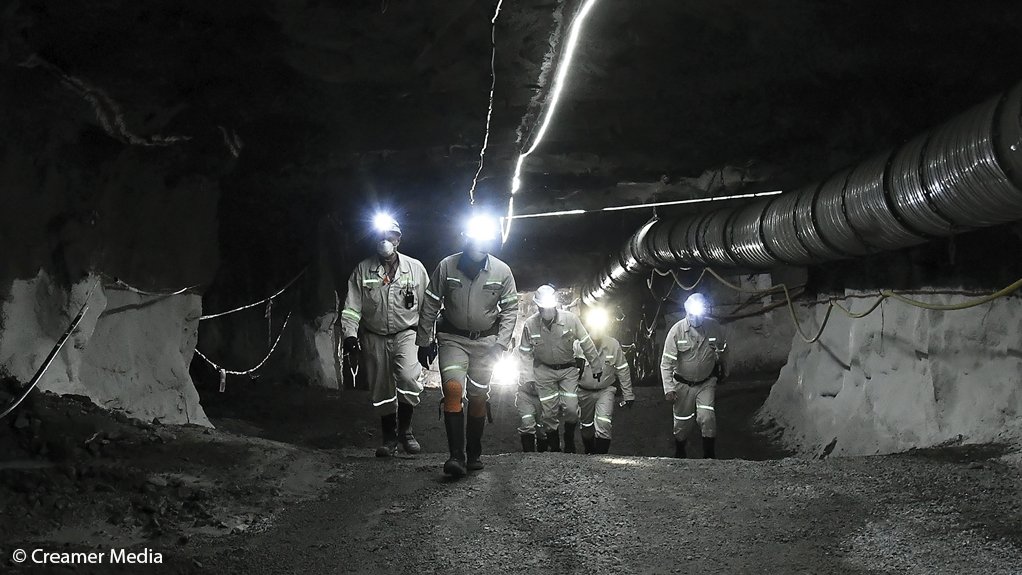An image of miners underground