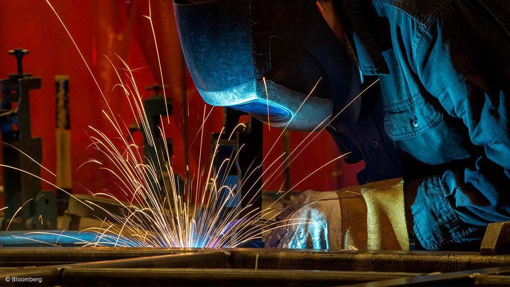 An image of a person welding