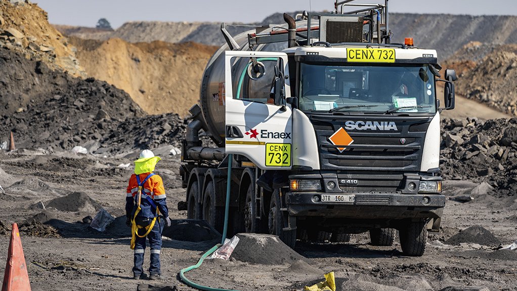 An image of a mine worker using Enaex's Mine I-Truck to delivers down-the-hole explosives