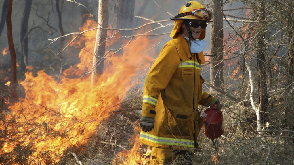 Prevention is better than cure.  CFA volunteer Deirdre Lucas working hazard reduction