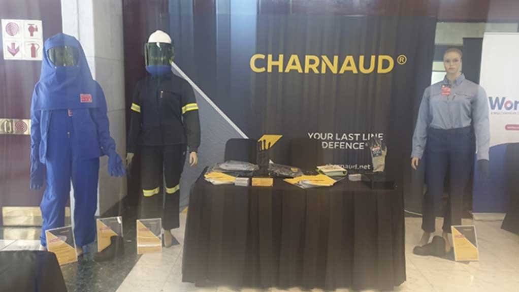 A Charnaud stand at an event with Hazmat suits, Reflective clothing, corporate clothing, gloves, goggles and boots