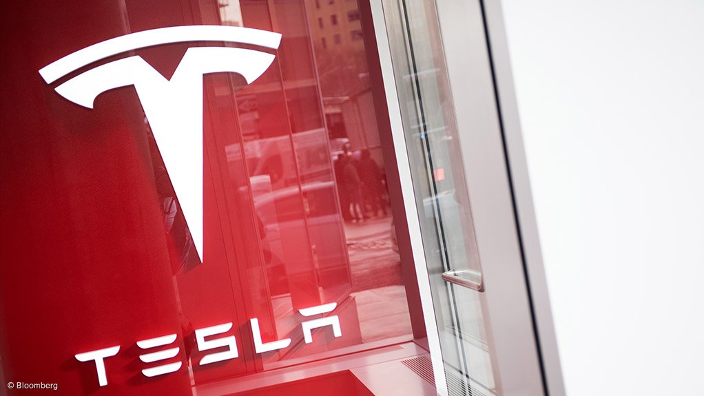 A photo of the Tesla logo