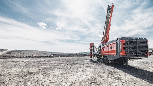 Picture of a Sandvik Leopard DI650i drilling system on an opencast mine