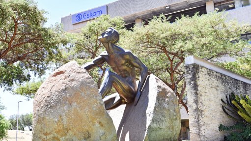 Photo of Eskom's rock-man statue at Megawatt Park