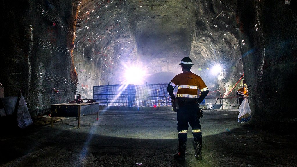 An image of an underground worker