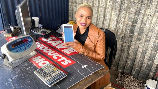 Melody Nyamakura, who works at the Main Buy-Back Centre in the Johannesburg CBD, shows how the centre uses the innovative recycling tracking platform, BanQu.