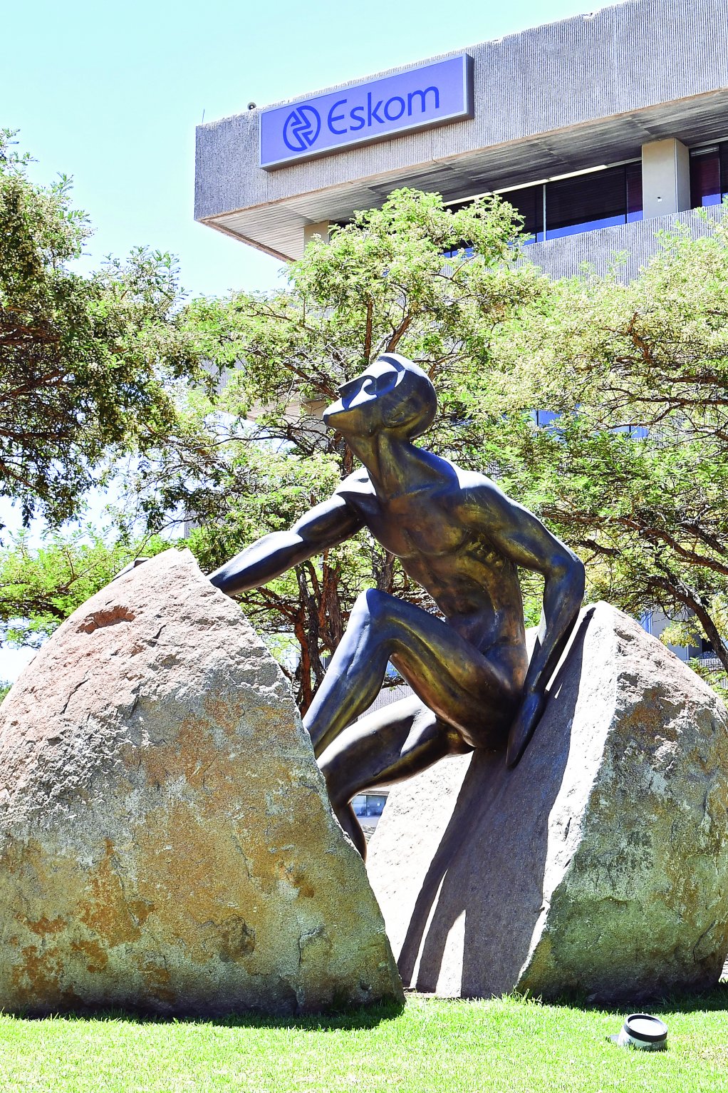 Photo of Eskom's rock-man statue at Megawatt Park