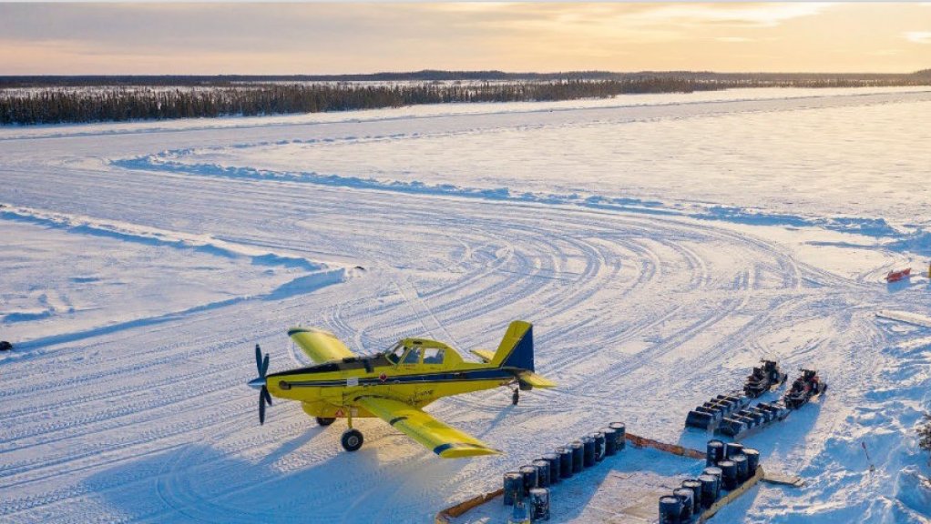 An image of an aeroplane on an ice runway in remote northern Ontario