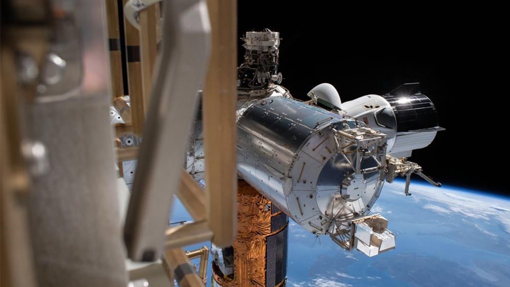 The Bartolomeo platform is visible attached to the lower part of the near end of the cylindrical Columbus Module of the ISS. 