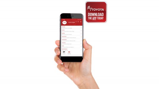 Image of a person holding a phone with the Toyota Connect app