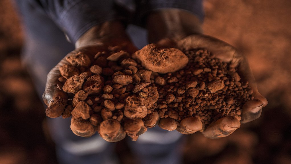 Image of bauxite in hands