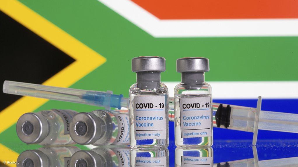 Covid-19 vaccines and South African flag 