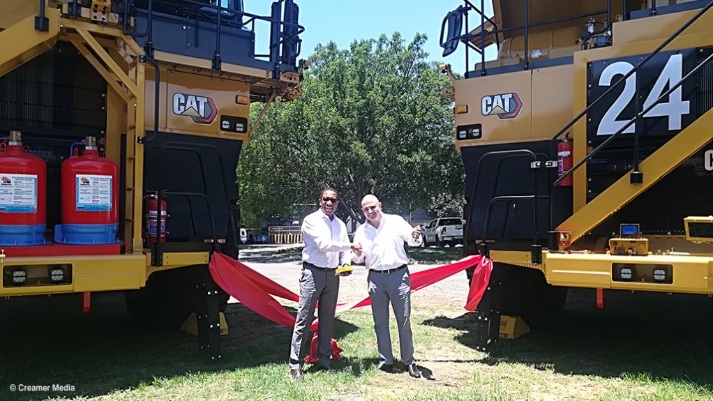 Tharisa CEO Phoevos Pouroulis and Barloworld Equipment Southern Africa CEO Emmy Lekka during the ribbon cutting and key handover 