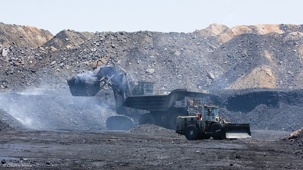 A photo of several machines engaged in opencast coal mining