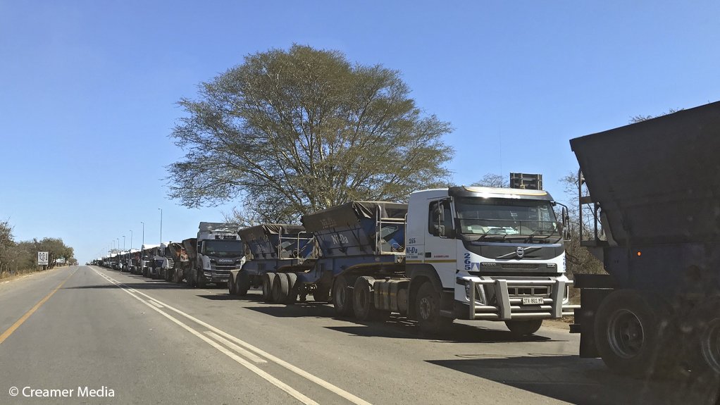 An image of freight trucks lining up for several kilometres on the N4 towards Komatipoort in South Africa