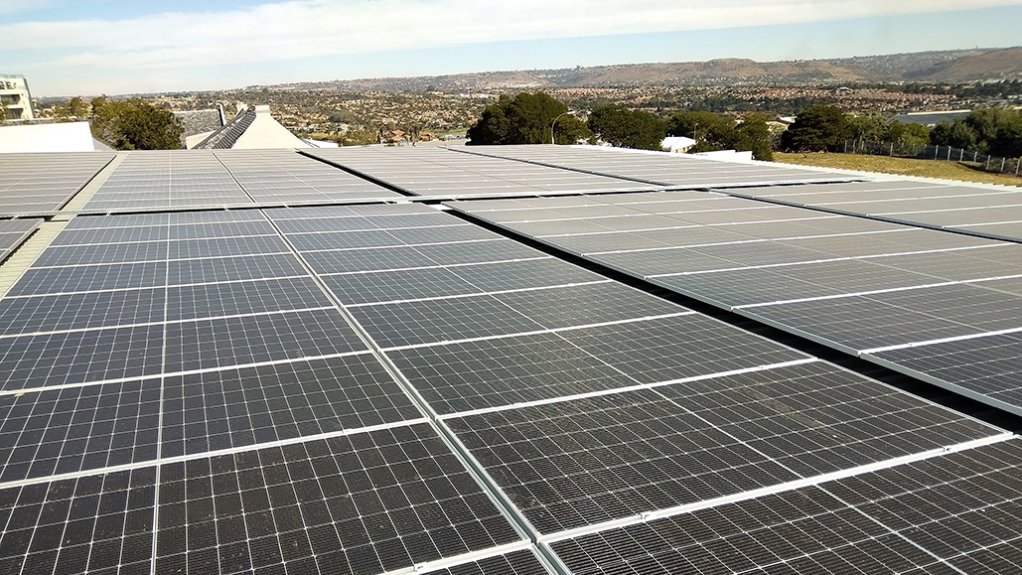 Picture of the PV panels on the roof of a retail development on the westrand