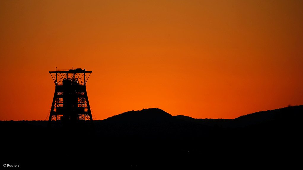 A silhouette of a mining headgear in South Africa