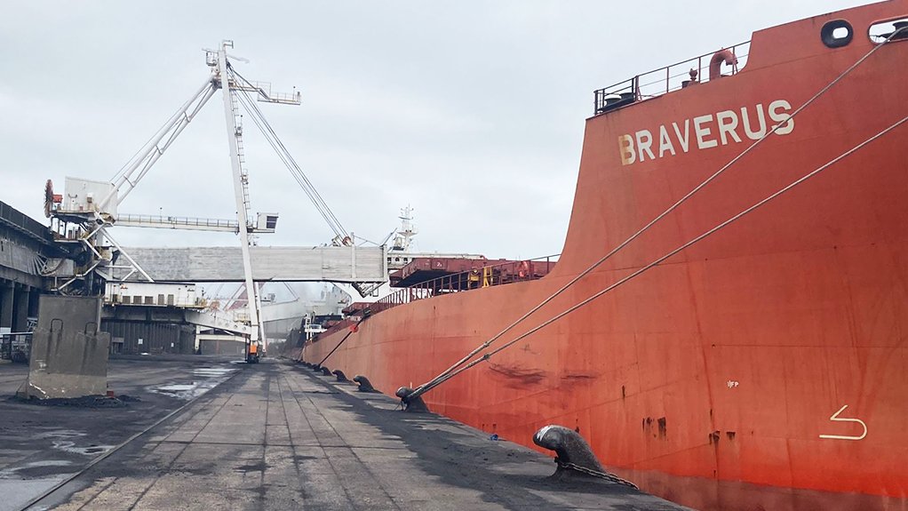 An image showing the MV Braverus loading magnetite at the Richards Bay Bulk Terminal 