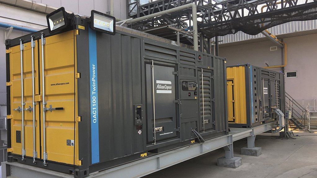 Image of two fully loaded Atlas Copco generators housed in one container 