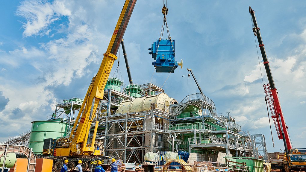Image of a WEG high voltage motor being lifted into position on site at Kamoa-Kakula