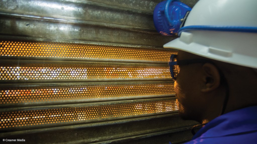 An employee working at Sibanye's Driefontein gold mine