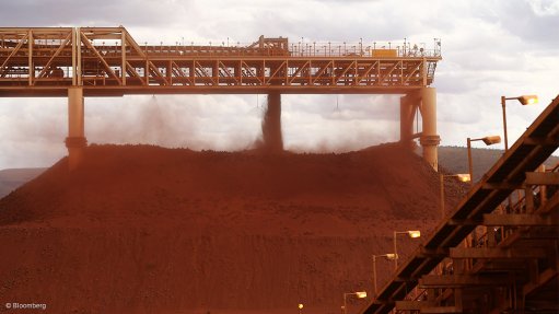 Image shows iron-ore stacking operations in the Pilbara 