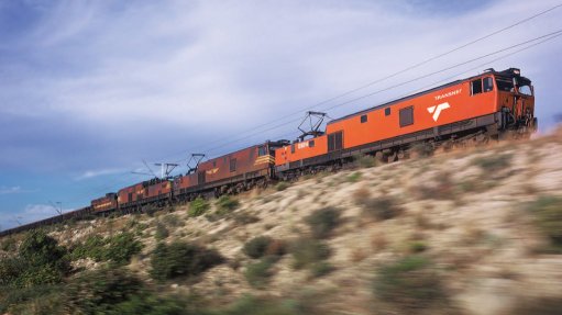 A photo of a moving Transnet train 